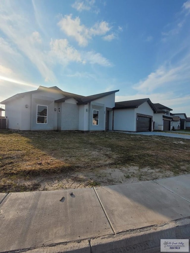 ranch-style house featuring a garage