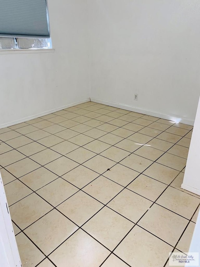 view of tiled empty room