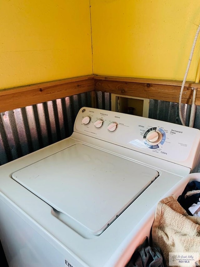 washroom with washer / dryer