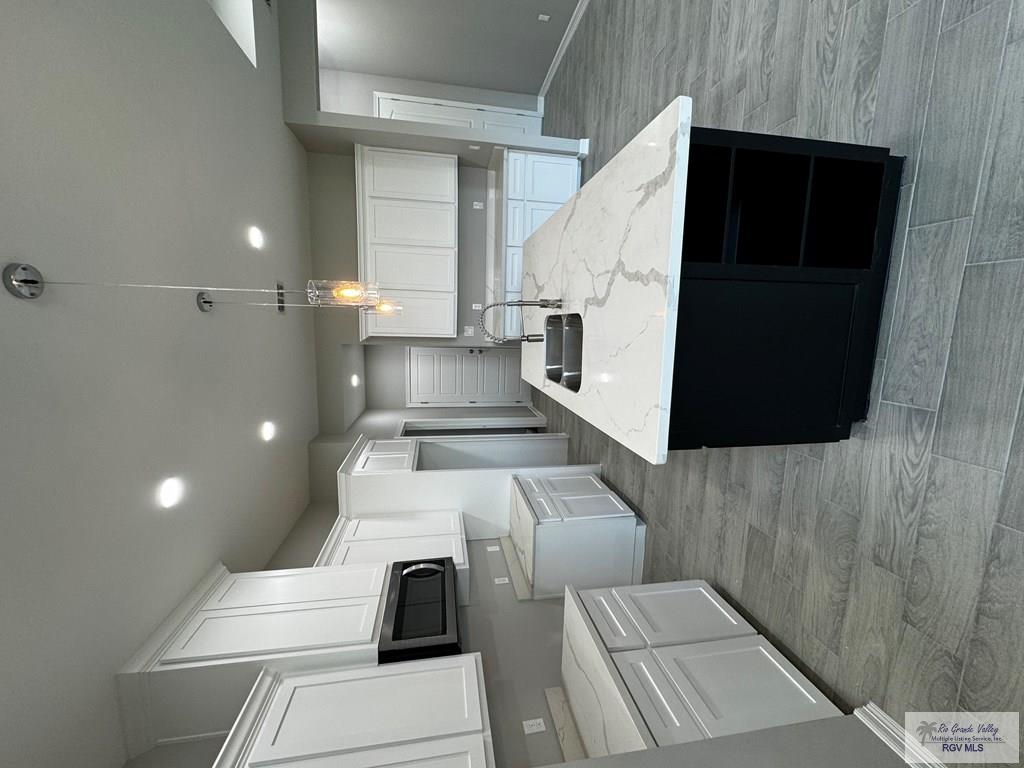 kitchen with white cabinetry