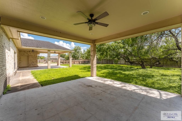 view of patio / terrace featuring ceiling fan