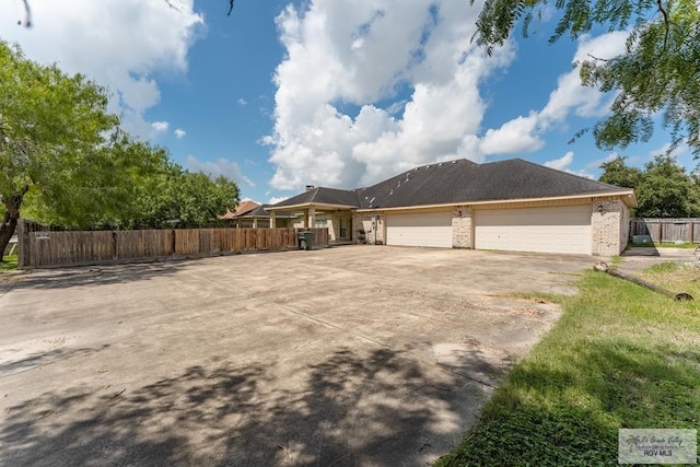 view of side of property featuring a garage