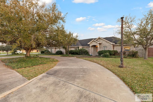 view of front of home with a front lawn