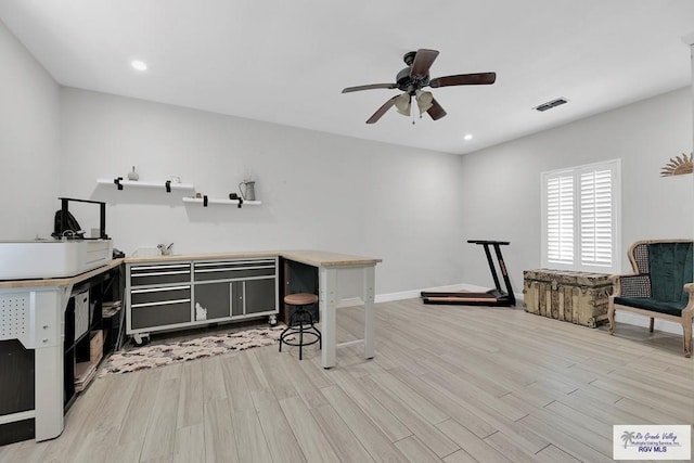 misc room with light hardwood / wood-style flooring and ceiling fan