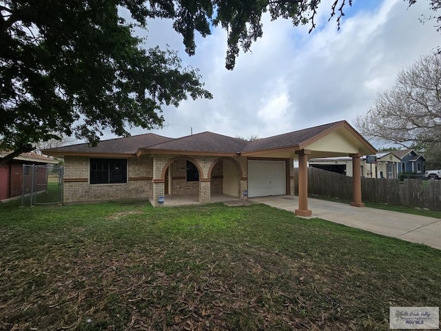 ranch-style house with a garage and a front lawn