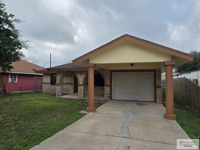 ranch-style house with a garage and a front lawn