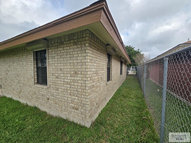 view of property exterior featuring a yard