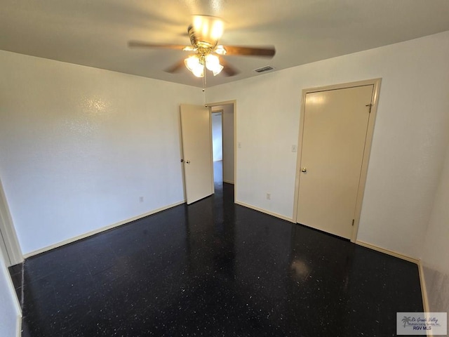 unfurnished room featuring ceiling fan