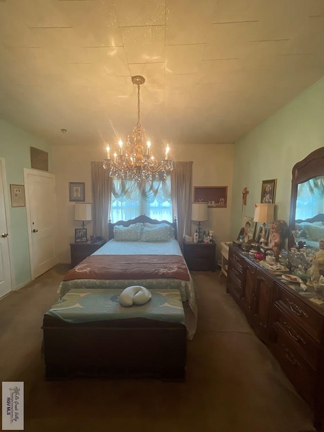 carpeted bedroom with an inviting chandelier