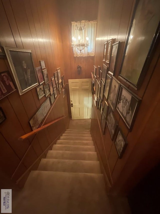 121 E Washington St, Brownsville, TX 78520 - staircase featuring a chandelier