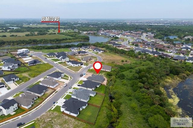 8830 Wentz Lk, Brownsville, TX 78520 - aerial overview of property's location featuring a nearby body of water and nearby suburban area
