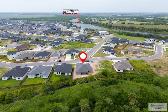 8830 Wentz Lk, Brownsville, TX 78520 - aerial view of property's location with a nearby body of water and nearby suburban area