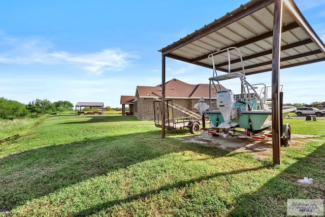 view of yard with a carport