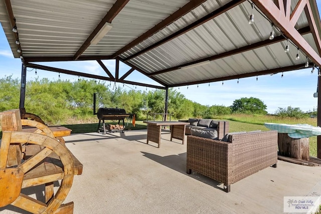 view of patio with a gazebo and a grill