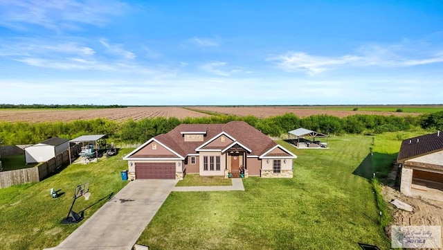 birds eye view of property featuring a rural view