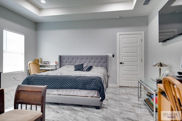 bedroom with baseboards, visible vents, a tray ceiling, recessed lighting, and marble finish floor