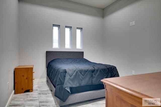 bedroom with baseboards