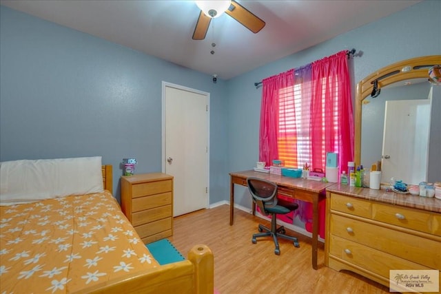 1137 Julissa Dr, Los Fresnos, TX 78566 - bedroom featuring a ceiling fan and wood finished floors