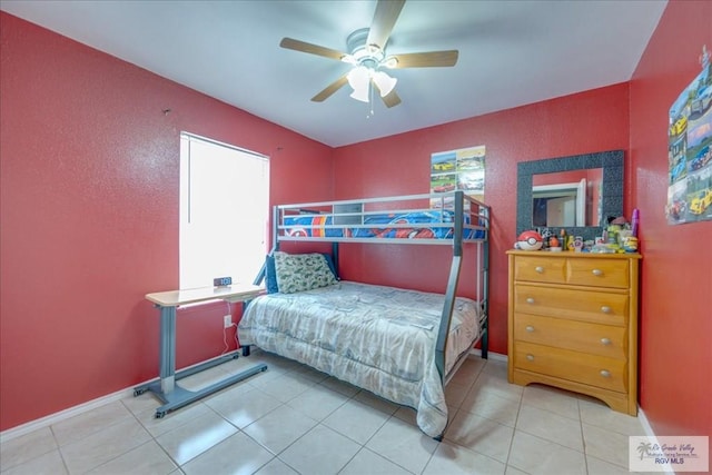 1137 Julissa Dr, Los Fresnos, TX 78566 - tiled bedroom featuring baseboards and a ceiling fan