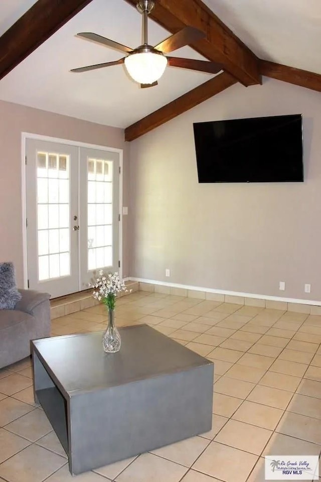 tiled living room featuring vaulted ceiling with beams, ceiling fan, and french doors