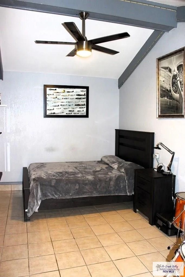 tiled bedroom with vaulted ceiling with beams and ceiling fan