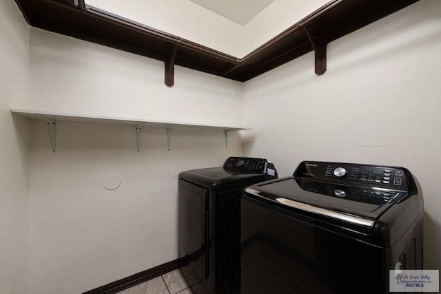 6705 Stone Oak Dr, Brownsville, TX 78526 - laundry room with separate washer and dryer and baseboards
