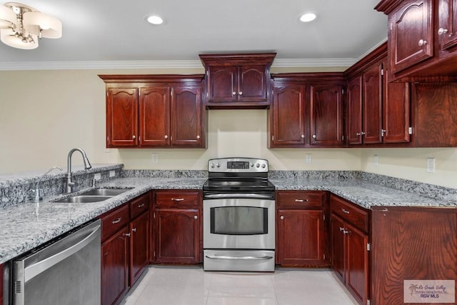 kitchen with light stone countertops, stainless steel appliances, ornamental molding, and sink