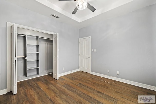 3271 Emerald Valley Blvd Unit 8, Brownsville, TX 78526 - unfurnished bedroom with wood finished floors, a raised ceiling, and a ceiling fan