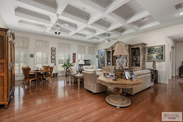 living room featuring coffered ceiling, crown molding, ceiling fan, beam ceiling, and wood-type flooring