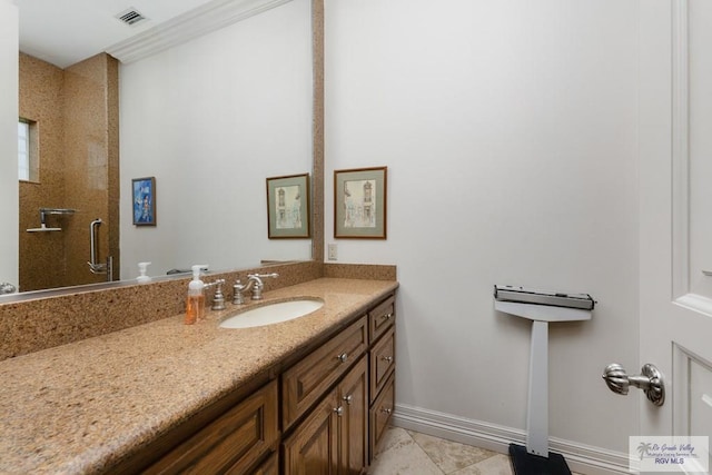 bathroom featuring tile patterned floors and vanity