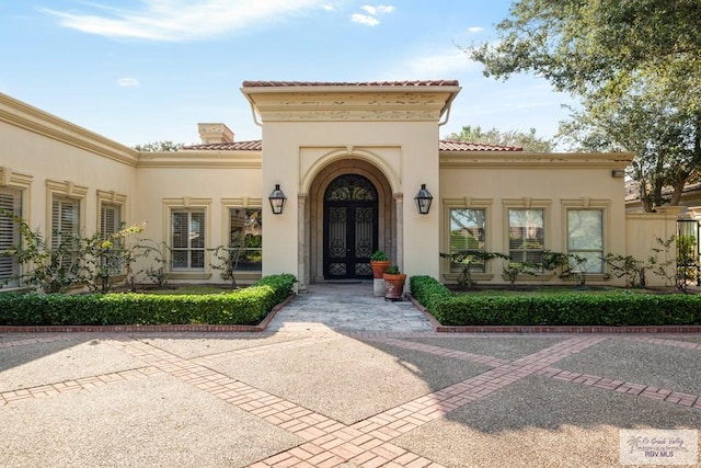 entrance to property with french doors