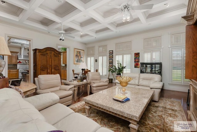 living room with beam ceiling, ceiling fan, coffered ceiling, crown molding, and hardwood / wood-style floors