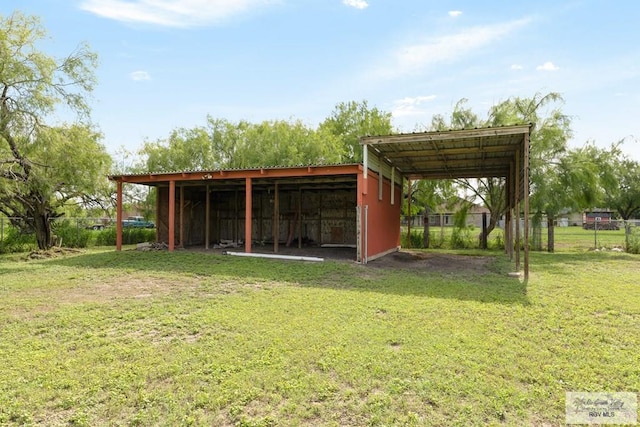 view of outdoor structure with a yard