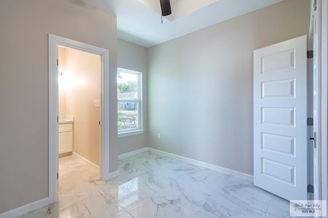 interior space featuring ceiling fan