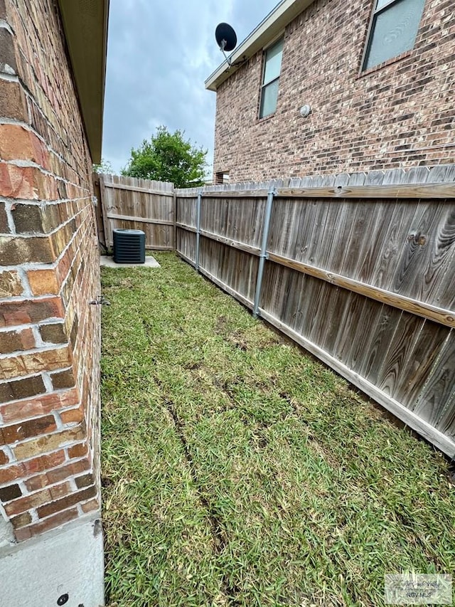 2611 E Eisenhower Ave Unit 50, Alton, TX 78573 - view of yard featuring central AC