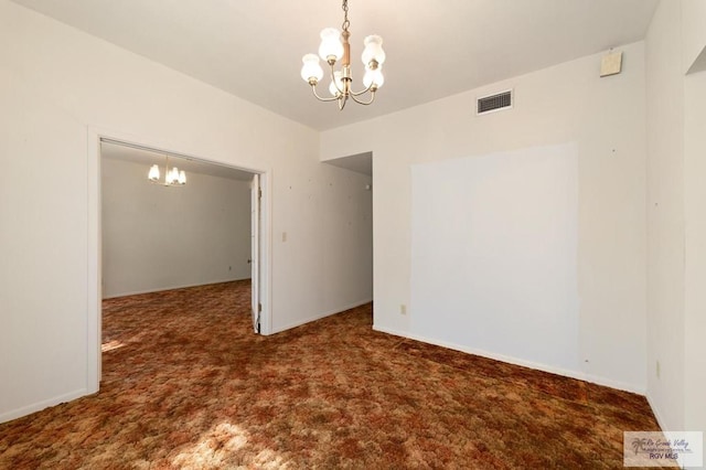 empty room featuring a chandelier, carpet, and visible vents