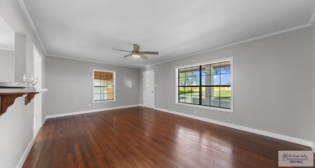 23570 Stuart Place Rd, Harlingen, TX 78552 - unfurnished living room with plenty of natural light, dark wood-style floors, a ceiling fan, baseboards, and crown molding