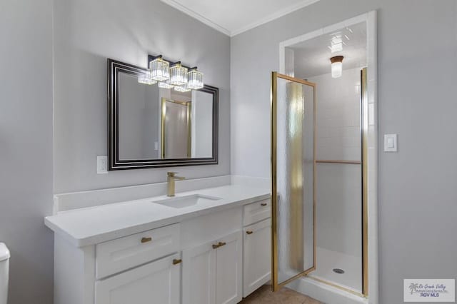 23570 Stuart Place Rd, Harlingen, TX 78552 - bathroom featuring vanity, a stall shower, toilet, ornamental molding, and a chandelier