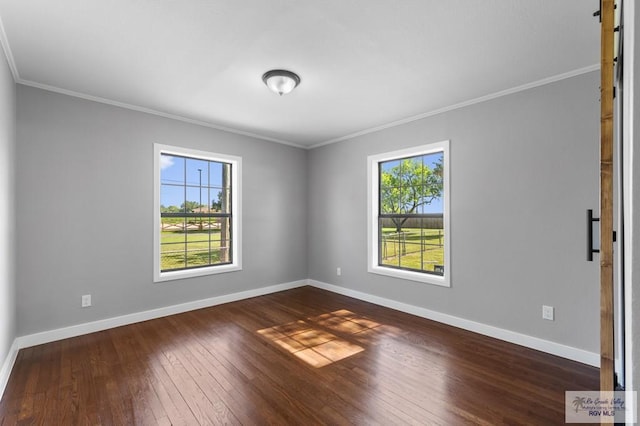 23570 Stuart Place Rd, Harlingen, TX 78552 - unfurnished room featuring dark wood-style flooring, ornamental molding, and baseboards