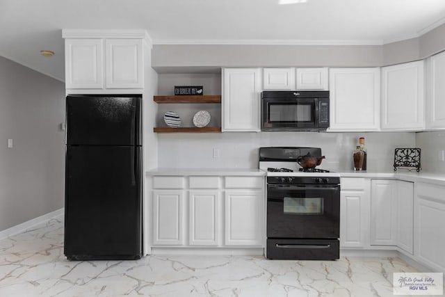 23570 Stuart Place Rd, Harlingen, TX 78552 - kitchen featuring black appliances, light marble finish floors, light countertops, white cabinets, and crown molding