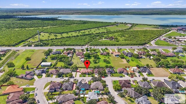 birds eye view of property featuring a water view