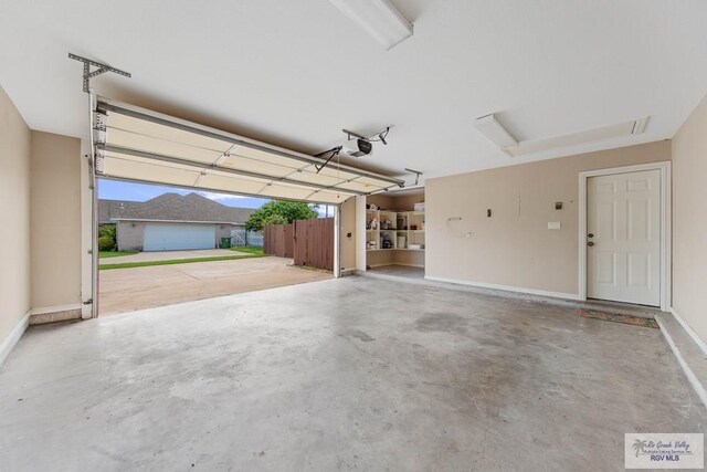 garage featuring a garage door opener