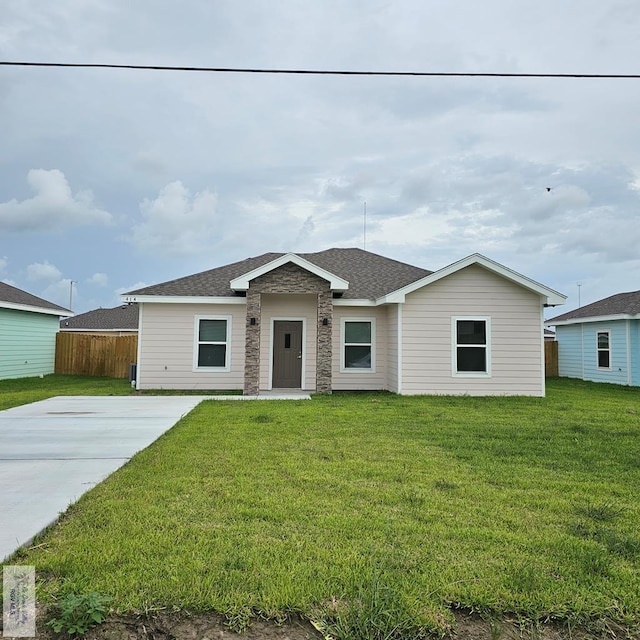 ranch-style house with a front yard