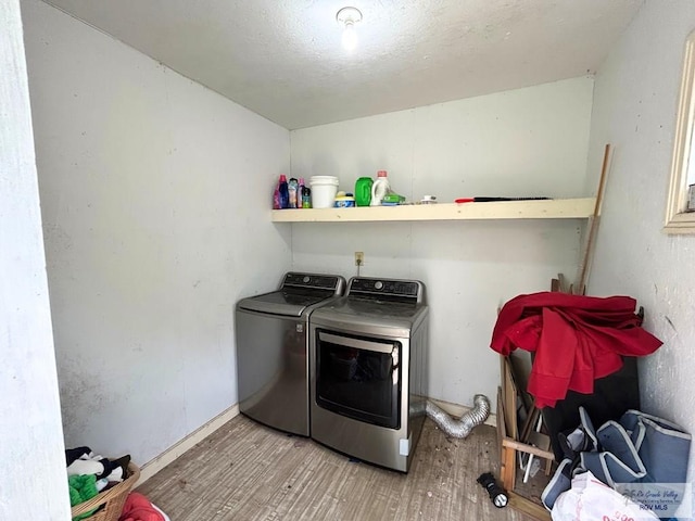 2013 E Jackson St, Harlingen, TX 78550 - washroom with wood finished floors and independent washer and dryer