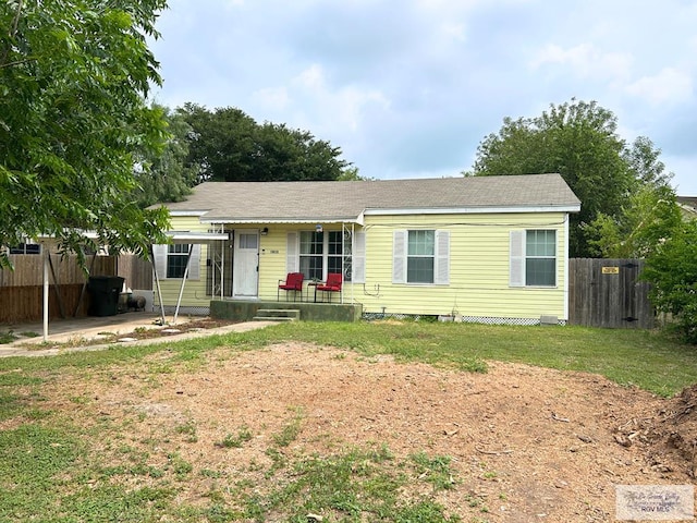 2013 E Jackson St, Harlingen, TX 78550 - single story home with a porch