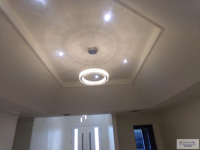 room details featuring a tray ceiling