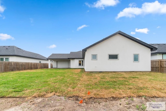 6221 King Palm Loop, Brownsville, TX 78526 - rear view of property featuring stucco siding and a garage