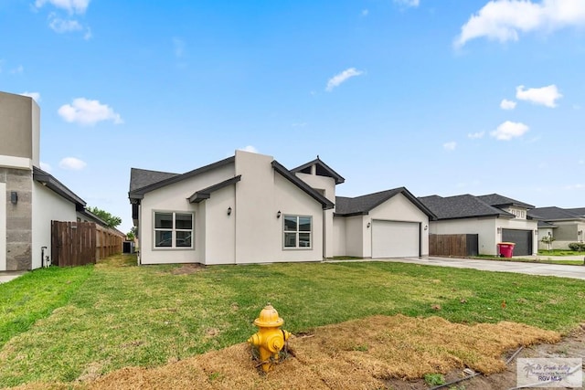 6221 King Palm Loop, Brownsville, TX 78526 - view of front of home featuring concrete driveway and a garage