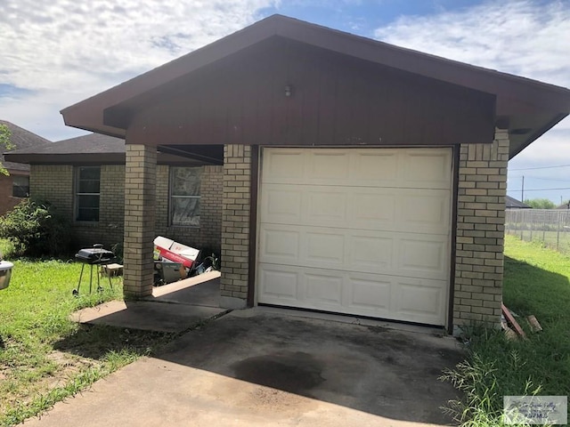 240 Palmero St, San Benito, TX 78535 - garage featuring concrete driveway