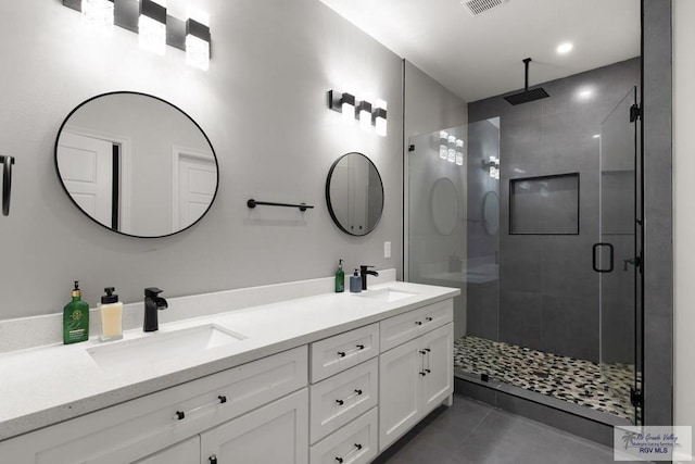 bathroom with vanity and walk in shower